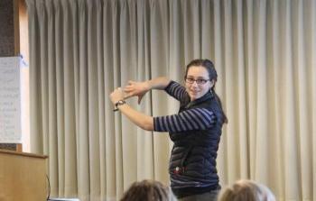 People's choice winner for best speed talk and best makeshift map of Alaska, Lindsey Parkinson, giving her talk on, 'Berry productivity in response to fire in northern and interior Alaska' Photo: Toni Klemm